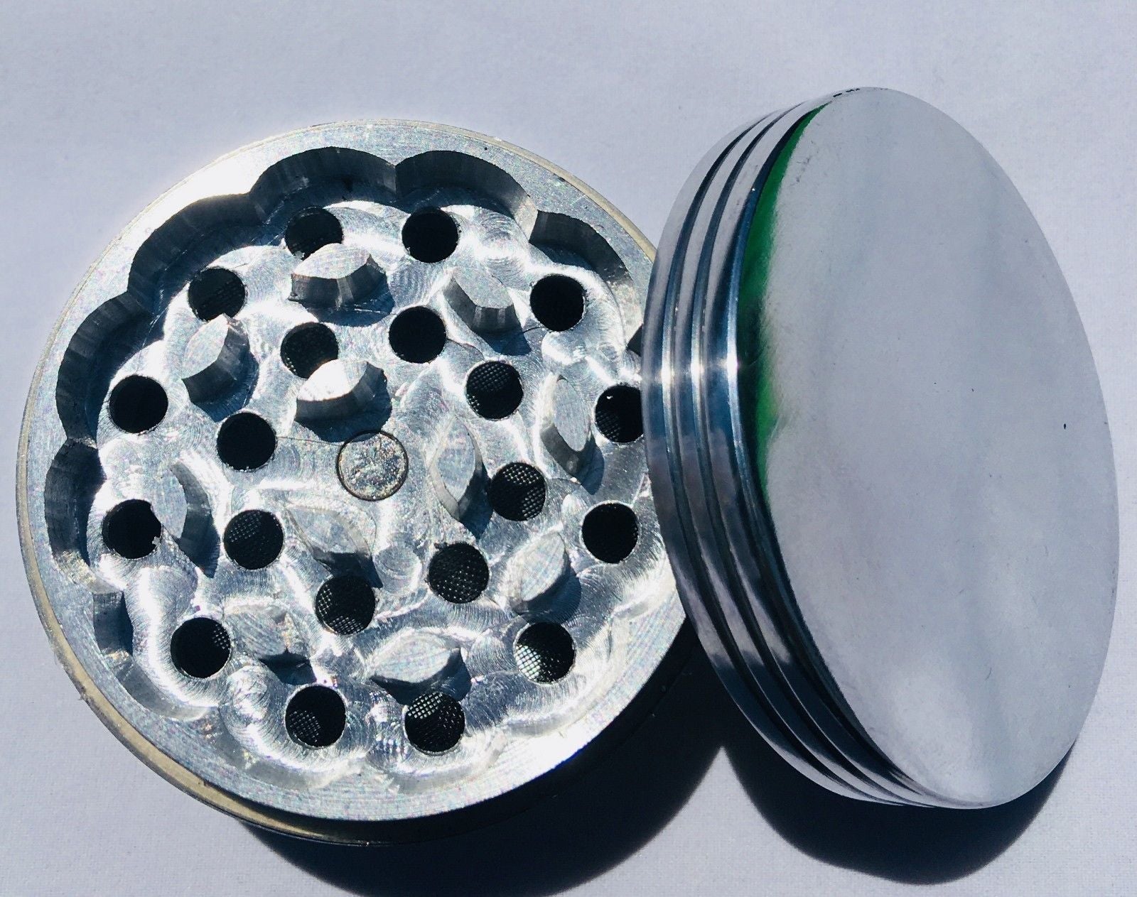 Black 4 Piece Magnetic 2.5 Inch Silver Metal Grinder StonedGenie.com Grinders